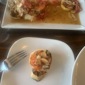 Shadows on the Hudson - Garlic Shrimp Toast with tomatoes and a savory sauce. - New American Near Me - Poughkeepsie, New York Shadows on the Hudson - Garlic Shrimp Toast with tomatoes and a savory sauce. - New American Near Me - Poughkeepsie, New York
