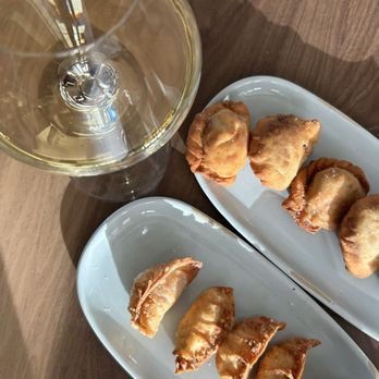 Nineteen 57 Bar & Restaurant - Empanadas and dumplings appetizer - New American Near Me - Reno, Nevada Nineteen 57 Bar & Restaurant - Empanadas and dumplings appetizer - New American Near Me - Reno, Nevada