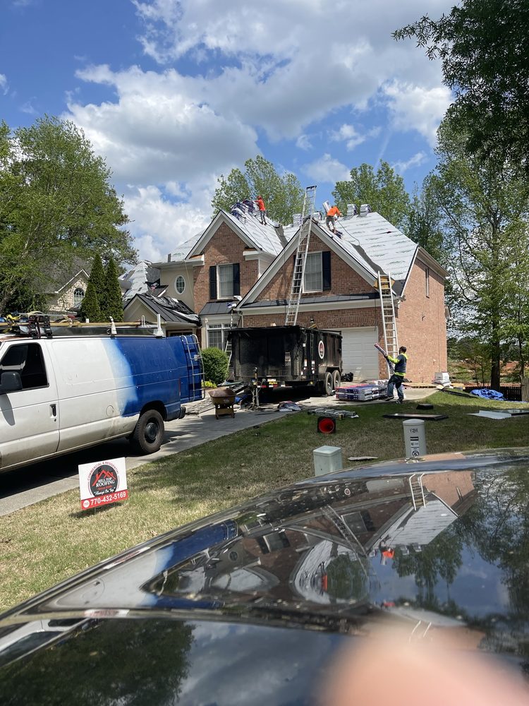 Slide of Hill Top Roofing