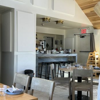 Jia Dim Sum - a dining room with a bar in the background - Dim Sum Near Me - Port Washington, New York Jia Dim Sum - a dining room with a bar in the background - Dim Sum Near Me - Port Washington, New York