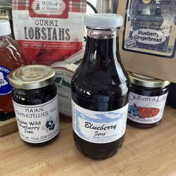 Maine's Own Treats - All the Maine & blueberry things: syrup, jam, tea, honey, salsa, mixes, plus tinned salmon, gummy lobsters, and a Moxie bumpah stickah!