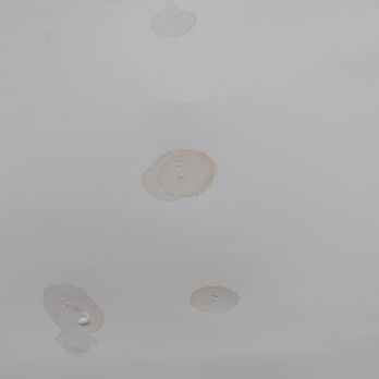 Capital Roofing Construction - Water damage in the ceiling of an apartment caused by the leaks in Capital's roof - Roofing Near Me Capital Roofing Construction - Water damage in the ceiling of an apartment caused by the leaks in Capital's roof - Roofing Near Me