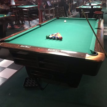 Slick Willie's Family Pool Hall - a pool table - Pool Halls Near Me - Houston, Texas