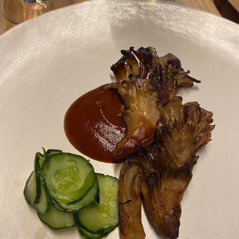 Tomo - Veg option: maitake mushroom, quick pickled cucumbers, and asado negro sauce - New American Near Me - Seattle, Washington Tomo - Veg option: maitake mushroom, quick pickled cucumbers, and asado negro sauce - New American Near Me - Seattle, Washington