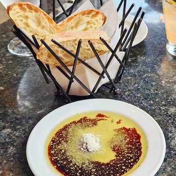 Barbatella - Crusty warm bread with dipping sauce. - Italian Near Me - Naples, Florida