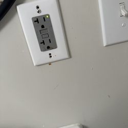Continental Motel & Apartments - Bathroom outlet with blood or fecal matter all over it.