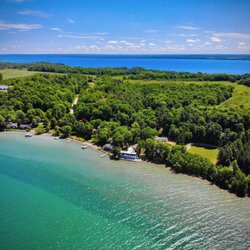 Matt Kraft Realty - Traverse City, MI - Let me help you leverage the sale of your vacation home by using an agent with global reach and Metro area connections.