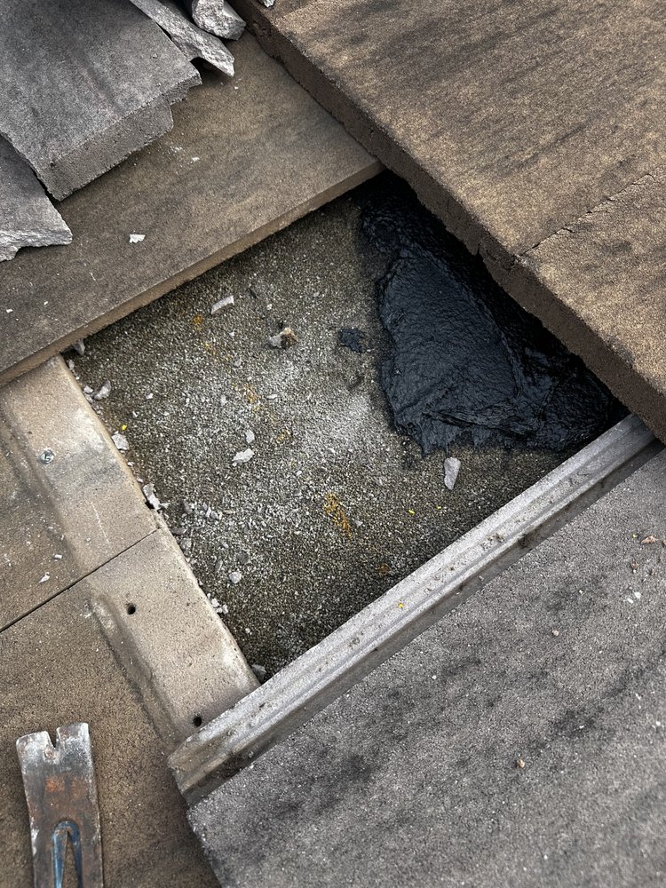 Slide of Tropical Roofing Services