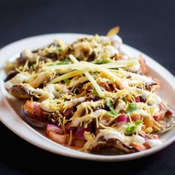 Tiffin - Eggplant Chaat...Crispy baby eggplant with toppings of yogurt, tamarind, and red onion. - Indian Near Me - Philadelphia, Pennsylvania Tiffin - Eggplant Chaat...Crispy baby eggplant with toppings of yogurt, tamarind, and red onion. - Indian Near Me - Philadelphia, Pennsylvania