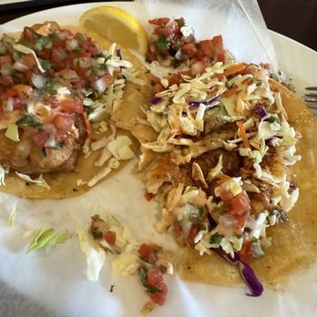 The City Fish - Fried fish taco on the left. Grilled fish taco on the right. - Sandwiches Near Me - Morgan Hill, California The City Fish - Fried fish taco on the left. Grilled fish taco on the right. - Sandwiches Near Me - Morgan Hill, California