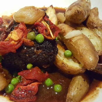 Montrio - Braised short ribs with house sundried tomatoes & fingerling potatoes instead of whipped potato - New American Near Me - Monterey, California Montrio - Braised short ribs with house sundried tomatoes & fingerling potatoes instead of whipped potato - New American Near Me - Monterey, California
