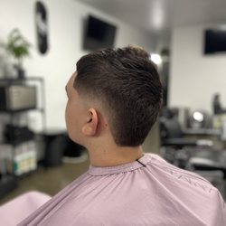 Solano Ave Barber Shop - Burst fade / cut by Mo