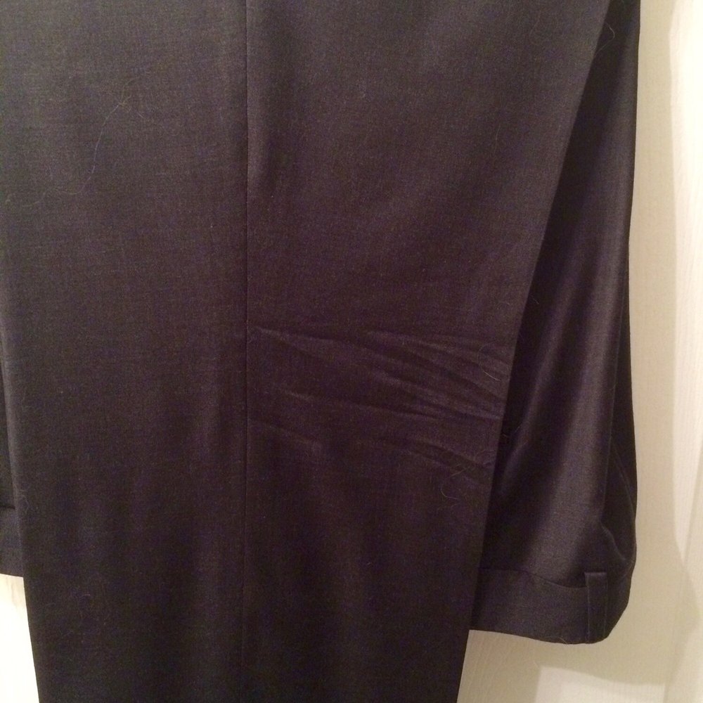 Creases still in my husband's wedding suit.