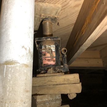 Level Home Foundation Repair - Left their jack directly underneath floor stacked up on wood - Foundation Repair Near Me - Springhill, Louisiana Level Home Foundation Repair - Left their jack directly underneath floor stacked up on wood - Foundation Repair Near Me - Springhill, Louisiana