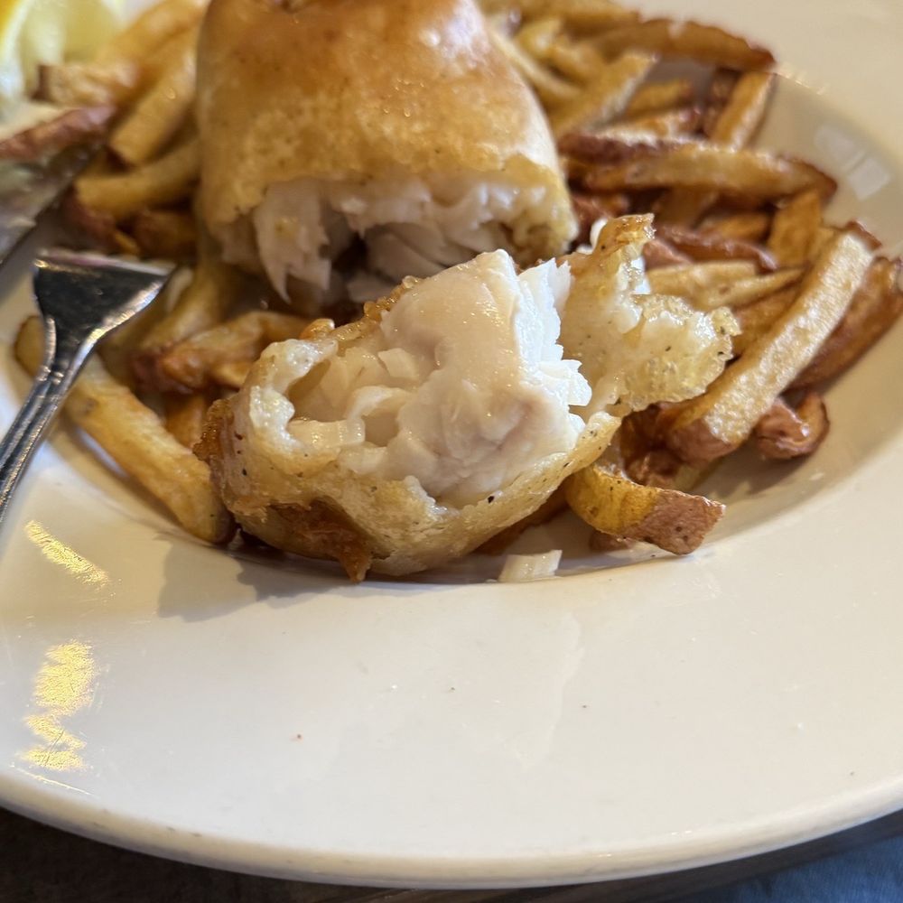 Graze - Flakey and hot interior of gluten-free fish and chips - Bars Near Me - Canmore, Alberta Graze - Flakey and hot interior of gluten-free fish and chips - Bars Near Me - Canmore, Alberta