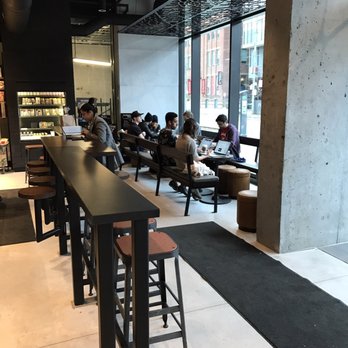 Starbucks - people sitting at tables in a coffee shop - Coffee & Tea Near Me - Toronto, Ontario Starbucks - people sitting at tables in a coffee shop - Coffee & Tea Near Me - Toronto, Ontario