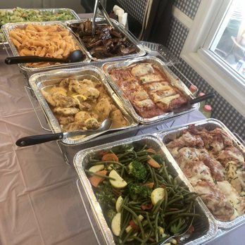 Boardwalk Bagel - a table full of food - Delis Near Me - Atlantic Beach, New York