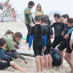 Summertime Surf School - Point Pleasant - Station Leader Sterv maps out a game plan for the group