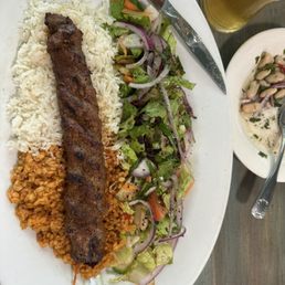 Spicy lamb kebab over rice Spicy lamb kebab over rice