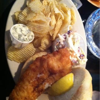 Riley's - Haddock Sandwich on Fridays.  Great tasting fish on a soft roll. Definitely have good breading. - Bars Near Me - Syracuse, New York