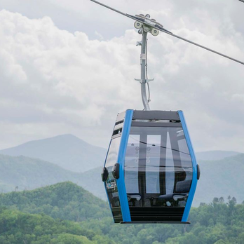 Anakeesta - A Crystal Express Gondola cabin carries guests from the Parkway in downtown Gatlinburg up to Anakeesta Mountain in the Great Smoky Mountains - Amusement Parks Near Me - Gatlinburg, Tennessee Anakeesta - A Crystal Express Gondola cabin carries guests from the Parkway in downtown Gatlinburg up to Anakeesta Mountain in the Great Smoky Mountains - Amusement Parks Near Me - Gatlinburg, Tennessee
