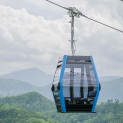 Anakeesta - A Crystal Express Gondola cabin carries guests from the Parkway in downtown Gatlinburg up to Anakeesta Mountain in the Great Smoky Mountains