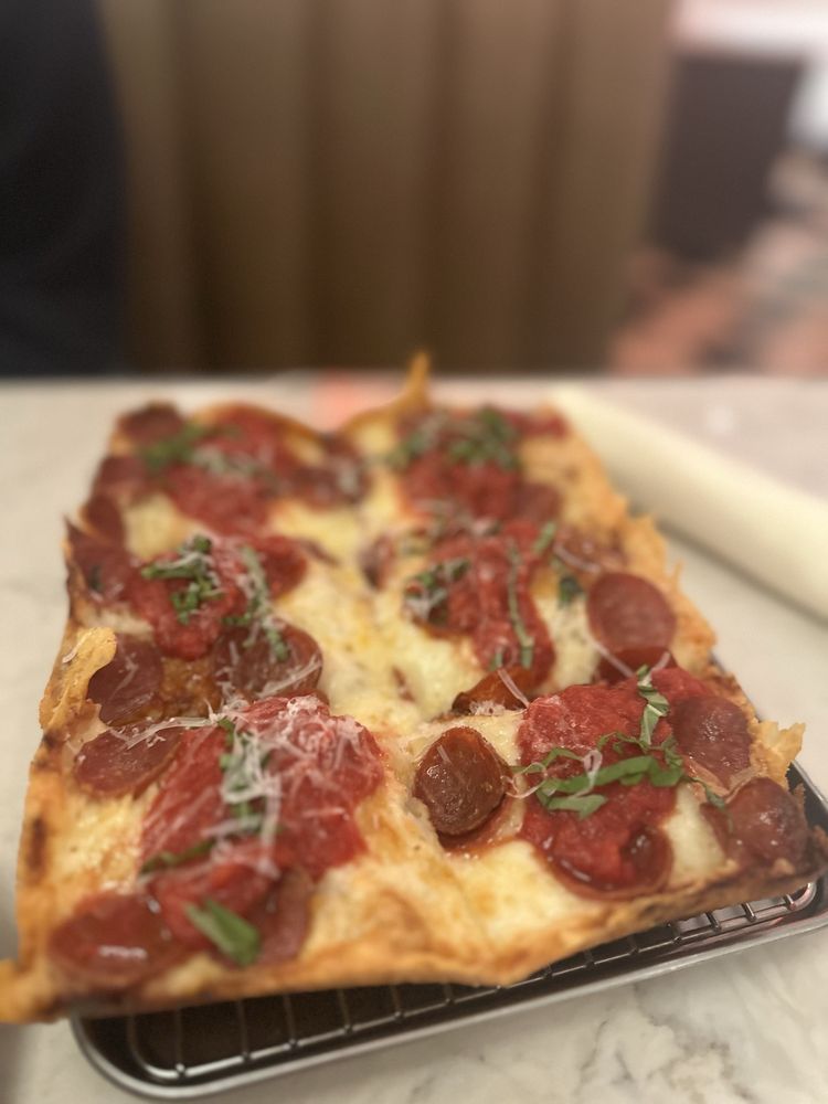 Dola Jean's Pizza Logo