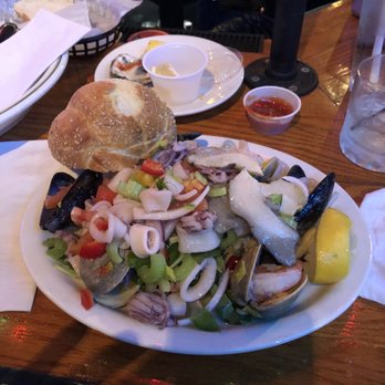 Uncle Vinnie's Clam Bar - Small seafood salad and some seeded twist bread. - Seafood Near Me - Raritan, New Jersey Uncle Vinnie's Clam Bar - Small seafood salad and some seeded twist bread. - Seafood Near Me - Raritan, New Jersey