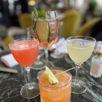 Café Riggs - Bankers cocktail (special, with mezcal and aperol), Riggs spritz, Apple Sour mocktail and East 8 Hold Up. - Breakfast & Brunch Near Me - Washington, DC, District of Columbia Café Riggs - Bankers cocktail (special, with mezcal and aperol), Riggs spritz, Apple Sour mocktail and East 8 Hold Up. - Breakfast & Brunch Near Me - Washington, DC, District of Columbia