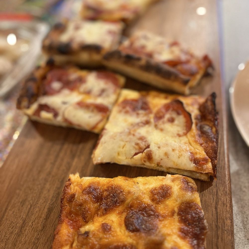 Cafe Cappuccino - Sausage Bakery Style Pizza; Pepperoni Bakery Style Pizza (each slice is 1/4 of an order) - Cafes Near Me - Lemont, Illinois