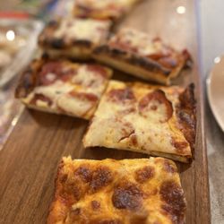 Cafe Cappuccino - Sausage Bakery Style Pizza; Pepperoni Bakery Style Pizza (each slice is 1/4 of an order)