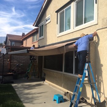 Excellence Awning Service - Max is checking the old Awning - Awnings Near Me - Fullerton, California