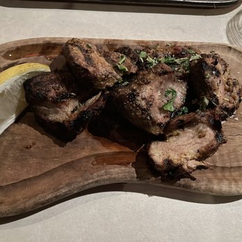 Krasi - Pork tenderloin. Mouthwatering - Mediterranean Near Me - Boston, Massachusetts Krasi - Pork tenderloin. Mouthwatering - Mediterranean Near Me - Boston, Massachusetts