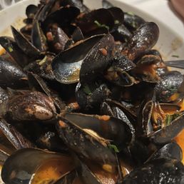 a plate of steamed mussels a plate of steamed mussels