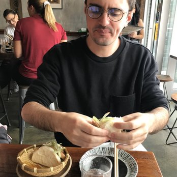 Ramen Wasabi - Friend enjoying his Chicken Char Siu Bun - Ramen Near Me - Chicago, Illinois