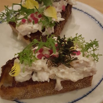 Emmer & Rye - Smoked Snapper and mustard greens served on large Red Fife Toast - Tapas/Small Plates Near Me - Austin, Texas