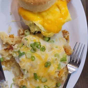 Biscuit House - biscuit sandwich combo  - added salt and pepper  biscuit slipped - didn't affect the flavor but a bit messy - Breakfast & Brunch Near Me - Schertz, Texas