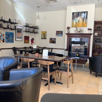 The Vintage Cafe - tables, chairs, and a fireplace - Cafes Near Me - Hudson, Massachusetts The Vintage Cafe - tables, chairs, and a fireplace - Cafes Near Me - Hudson, Massachusetts