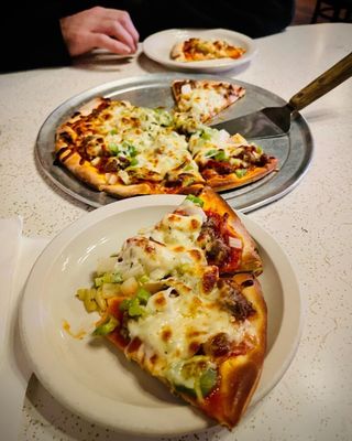 Leaning Tower of Pizza by null