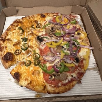 Manizza's Pizza - Half Nashville Hot and half Supreme pizza. - Pizza Near Me - Las Vegas, Nevada Manizza's Pizza - Half Nashville Hot and half Supreme pizza. - Pizza Near Me - Las Vegas, Nevada