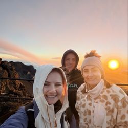Elite Taxi Tours - Two girls with Charlie, the owner and driver of Elite Taxi. Sunrise at Halakalea National Park