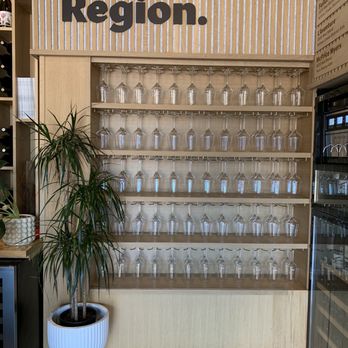 Region - a display of wine glasses in a wine shop - Wine Bars Near Me - San Luis Obispo, California Region - a display of wine glasses in a wine shop - Wine Bars Near Me - San Luis Obispo, California