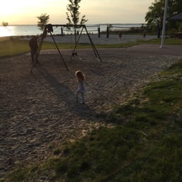 On the swings at the beach