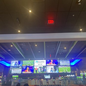 Dave & Buster's - Bar area overlooking the dining section. There are more table seating there as well. - American Near Me - Brooklyn, New York Dave & Buster's - Bar area overlooking the dining section. There are more table seating there as well. - American Near Me - Brooklyn, New York