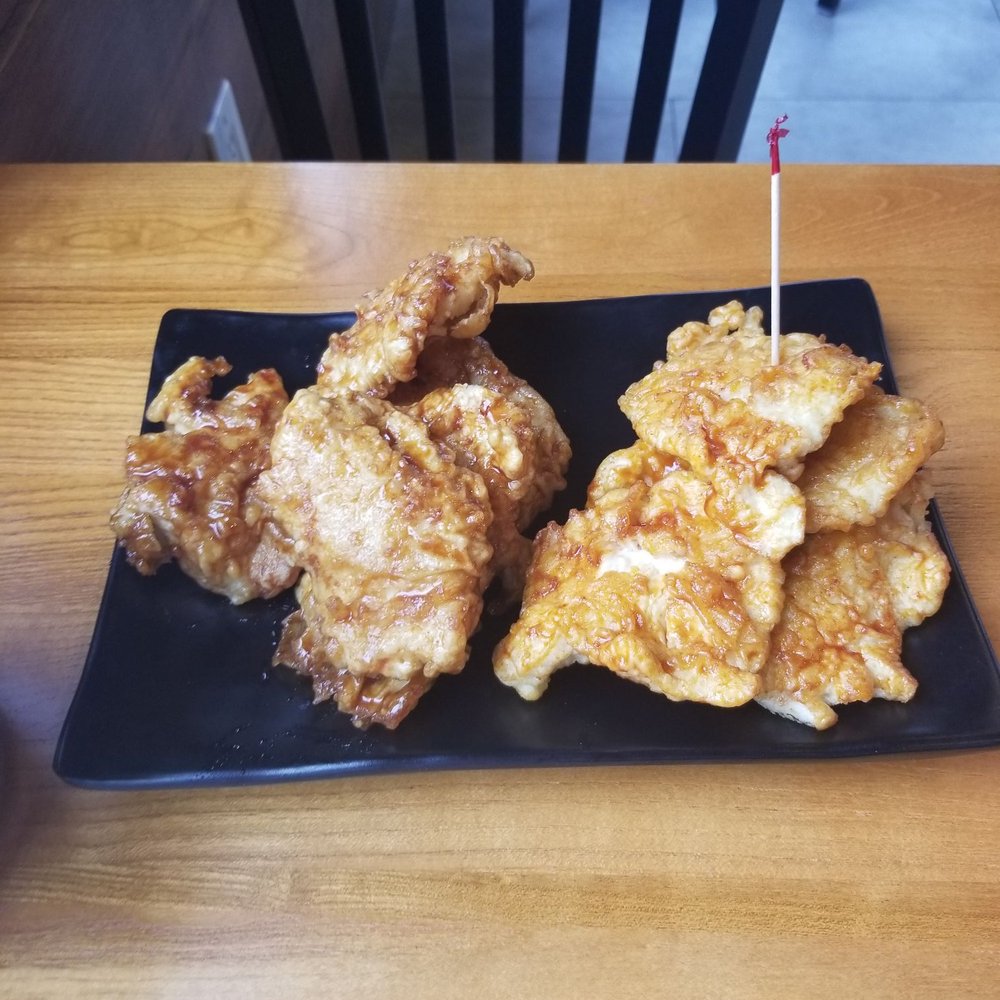 Bonchon Flushing Northern - 10 Chicken Strips, 5 Soy Garlic (left) and 5 Spicy (Right) - Korean Near Me - Flushing, New York