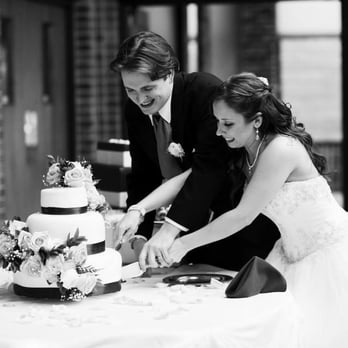 Baker On the Block - Bride & Groom Cutting The Cake - Bakeries Near Me