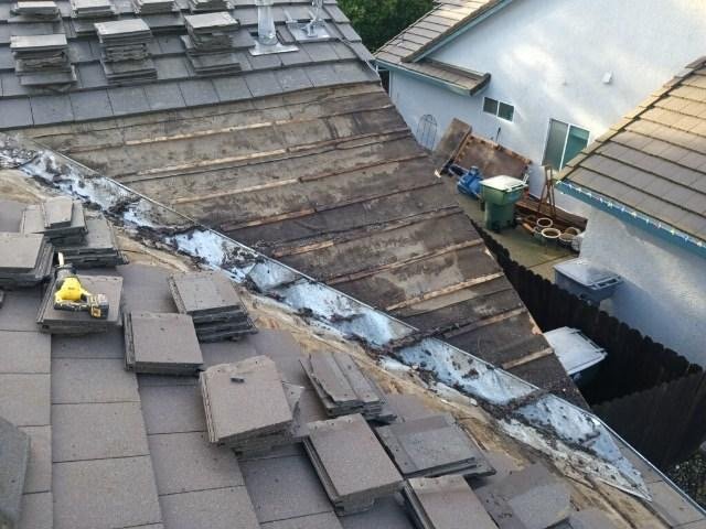 Slide of Quinn Bro's Roofing