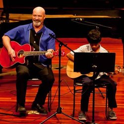 Evergreen Studio Of Music & The Arts - Our guitar teacher Mike Osborn during our seasonal recitals