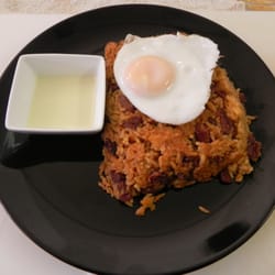 TACU-TACU. Peruvian style toasted and mixed rice & beans. Served with a spicy green sauce. Delicious!