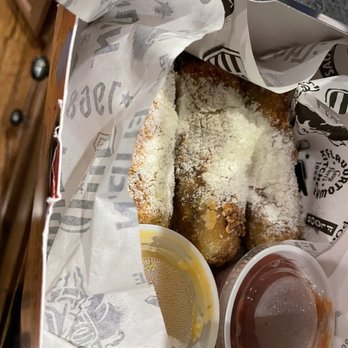 Guy Fieri's Flavortown Kitchen - Cheese steak egg rolls - Food Delivery Services Near Me Guy Fieri's Flavortown Kitchen - Cheese steak egg rolls - Food Delivery Services Near Me